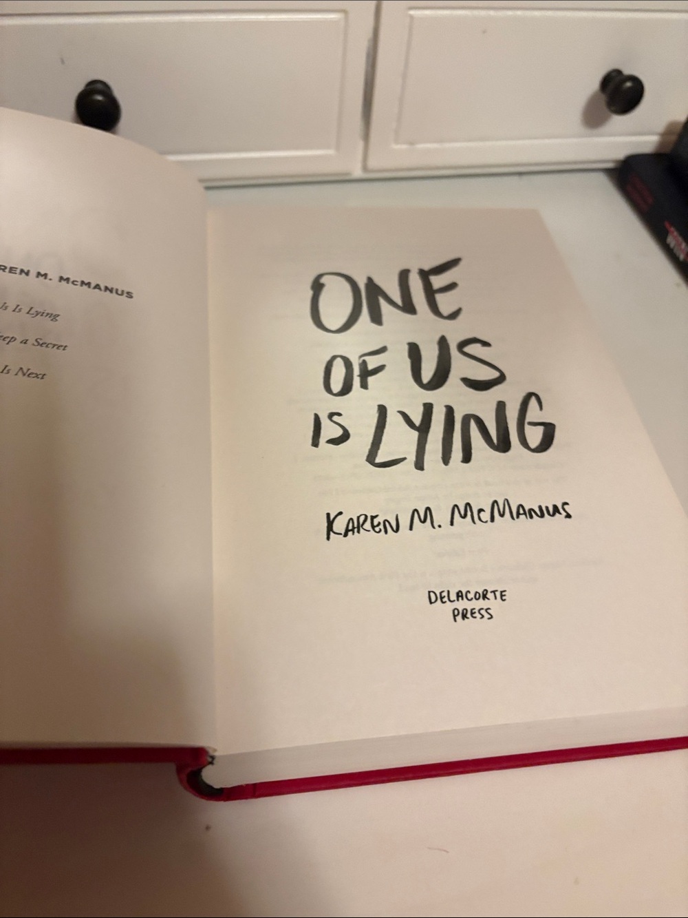 "One of Us Is Lying" Hardcover Book